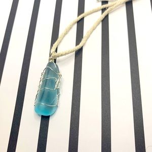 Beautiful aqua blue wire wrapped pendant
